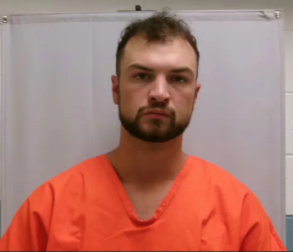 Tucker teacher arrested on abuse charge